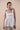 Beautiful Linen Babydoll Top with beading and embroidery designed by Fleur Kakasi.  Shoulder tie straps, adjustable fitting, and real freshwater pearl trim. 