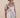 Beautiful Linen Babydoll Top with beading and embroidery designed by Fleur Kakasi.  Shoulder tie straps, adjustable fitting, and real freshwater pearl trim. 