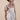 Beautiful Linen Babydoll Top with beading and embroidery designed by Fleur Kakasi.  Shoulder tie straps, adjustable fitting, and real freshwater pearl trim. 