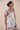 Beautiful Linen Babydoll Top with beading and embroidery designed by Fleur Kakasi.  Shoulder tie straps, adjustable fitting, and real freshwater pearl trim. 