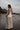 Beautiful Linen Babydoll Top with beading and embroidery designed by Fleur Kakasi.  Shoulder tie straps, adjustable fitting, and real freshwater pearl trim. 