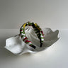 Beautiful pure silk knotted headband hair accessory in luxury Chartreuse Coral; design by Fleur Kakasi