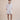 Beautiful shift kaftan dress in custom designed Broderie Anglaise cotton, designed by Fleur Kakasi.  Perfect resortwear look with mid-length sleeves and custom trims. 