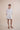 Beautiful shift kaftan dress in custom designed Broderie Anglaise cotton, designed by Fleur Kakasi.  Perfect resortwear look with mid-length sleeves and custom trims. 