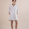 Beautiful shift kaftan dress in custom designed Broderie Anglaise cotton, designed by Fleur Kakasi.  Perfect resortwear look with mid-length sleeves and custom trims. 