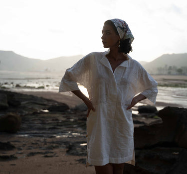 Beautiful shift kaftan dress in custom designed Broderie Anglaise cotton, designed by Fleur Kakasi.  Perfect resortwear look with mid-length sleeves and custom trims. 