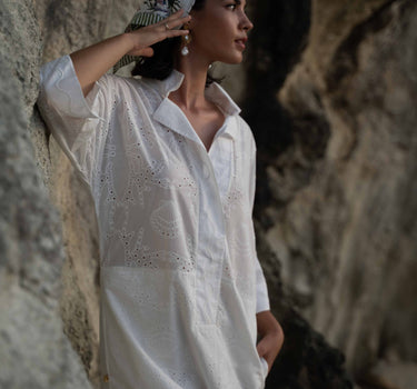 Beautiful shift kaftan dress in custom designed Broderie Anglaise cotton, designed by Fleur Kakasi.  Perfect resortwear look with mid-length sleeves and custom trims. 