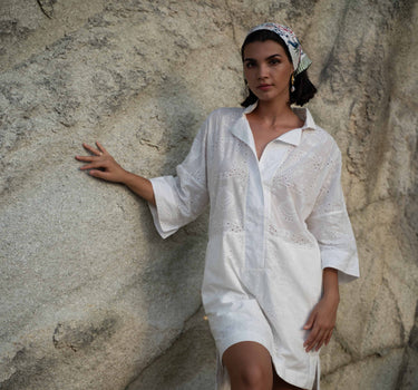 Beautiful shift kaftan dress in custom designed Broderie Anglaise cotton, designed by Fleur Kakasi.  Perfect resortwear look with mid-length sleeves and custom trims. 