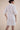 Beautiful shift kaftan dress in custom designed Broderie Anglaise cotton, designed by Fleur Kakasi.  Perfect resortwear look with mid-length sleeves and custom trims. 