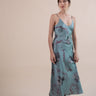 Beautiful luxurious pure silk slip dress gown in teal green with seashell and seaweed artwork designed by Fleur Kakasi.  Adjustable straps, mid-length. 
