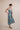 Beautiful luxurious pure silk slip dress gown in teal green with seashell and seaweed artwork designed by Fleur Kakasi.  Adjustable straps, mid-length. 