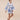 The Nerites dress is a short, popover style in 100% linen in a traditional but modernised kaftan style, with deep placket neckline and wide bell sleeves. Custom print by Fleur Kakasi, with hand embroidery and beading on the cuffs, hem, and double-length belt.