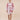 The Nerites dress is a short, popover style in 100% linen in a traditional but modernised kaftan style, with deep placket neckline and wide bell sleeves. Custom print by Fleur Kakasi, with hand embroidery and beading on the cuffs, hem, and double-length belt.