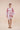 The Nerites dress is a short, popover style in 100% linen in a traditional but modernised kaftan style, with deep placket neckline and wide bell sleeves. Custom print by Fleur Kakasi, with hand embroidery and beading on the cuffs, hem, and double-length belt.