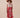 The Poseidon Wrap Skirt is a classic full-wrap style, below knee length, featuring extra long ties, and stunning applique and embroidery details on coral red linen. 
 The contrasting ivory applique features our signature coral motif, with glass pearl beads, and each tie features real natural baroque pearl charms at each end. Design by Fleur Kakasi