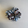The Thalassa is a beautiful voluminous scrunchie hair tie, made from beautiful 100% silk satin.  Hand painted design by Fleur Kakasi.